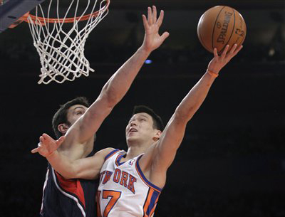 Knicks guard Jeremy Lin goes up for a layup against Atlanta Hawks center Zaza Pachulia in the first quarter of Wednesday night's game at Madison Square Garden.