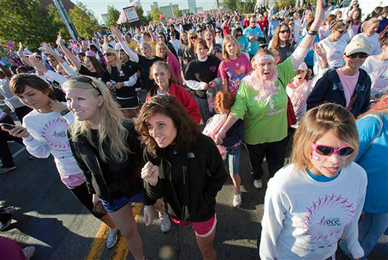 In this Saturday, Oct. 16, 2010 photo, some of an estimated 45,000 people participate in the Susan B. Komen Race for the Cure in Little Rock, Ark. (AP Photo/Brian Chilson)