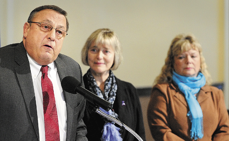 violence awareness speakers: Gov. Paul LePage, left, Julia Colpitts, of the Maine Coalition to End Domestic Violence, Donna Strickler, of the Sexual Assault Crisis & Support Center, and all spoke at a State House news conference regarding a domestic violence awareness initiative.