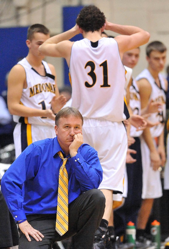 Photo by Michael G. Seamans Medomak Valley High School head coach Nicholas DePatsy reacts after a technical foul for too many men on the floor in the second half of the Eastern Class B semi-finals at the Bangor Auditorium Wednesday. Gardiner defeated Medomak Valley 57-46.