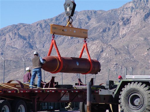 A weapon like this 30,000-pound penetrating bomb could be used in any attack on Iran's nuclear facilities. This photo provided by the Defense Threat Reduction Agency shows crews loading the bomb for a test at White Sands Missile Range in southern New Mexico in 2007.