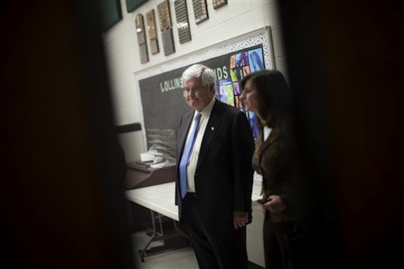 Republican presidential candidate and former House Speaker Newt Gingrich waits in a holding room before speaking at a campaign stop Saturday, Feb. 18, in Suwanee, Ga. (AP Photo/Evan Vucci)
