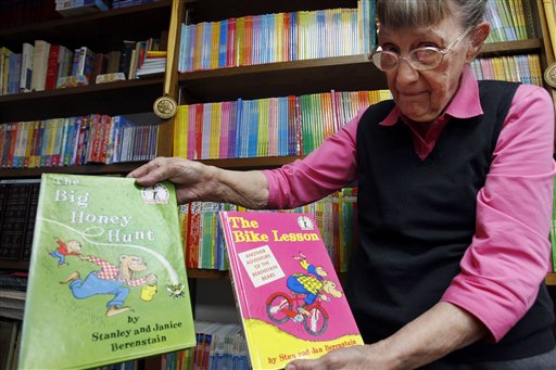 Jan Berenstain displays a copy of the first book, left, she and husband, Stanley Berenstain, created and the second book, which was the first to actually call the characters Berenstain Bears.