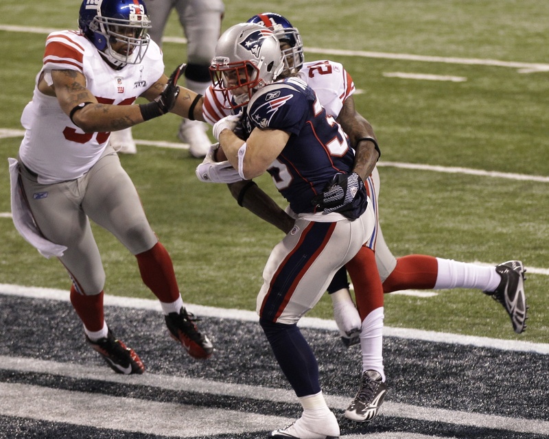 New England Patriots running back Danny Woodhead scores a touchdown with 8 seconds left in the first half of Super Bowl XLVI on Sunday.