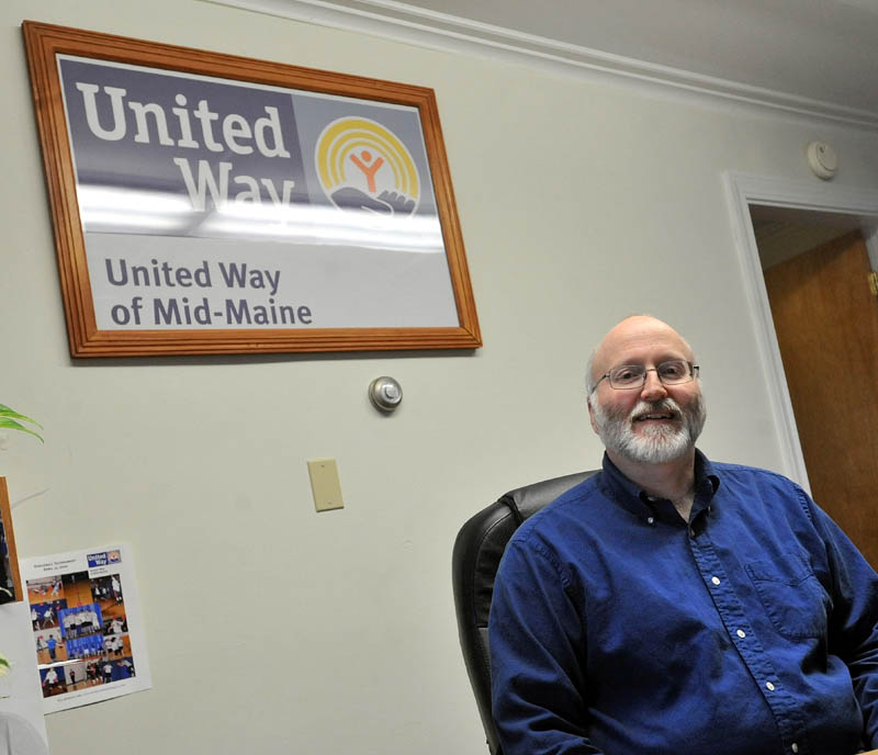 AT WORK: Peter Lyford, resource development coordinator for United Way at Mid-Maine, Inc., in his office on Friday: