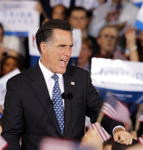 Mitt Romney reacts to supporters at his Florida primary night rally in Tampa on Tuesday.