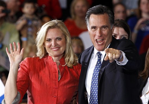 Republican presidential candidate, former Massachusetts Gov. Mitt Romney, stands with his wife Ann as he celebrates his Florida primary election win at the Tampa Convention Center. (AP Photo/Charles Dharapak)