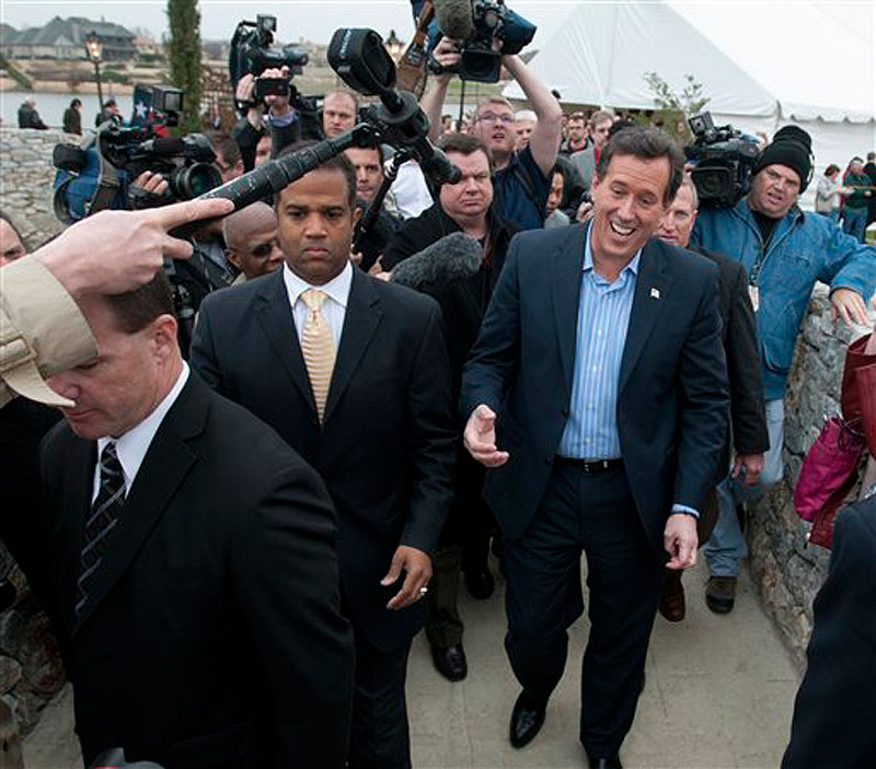 Republican presidential candidate Rick Santorum leaves after speaking at the Bella Donna Chapel in McKinney, Texas, Wednesday, Feb. 8, 2012. (AP Photo/Rex C. Curry)