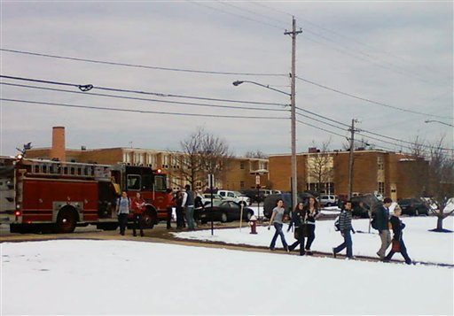 People are evacuated from Chardon High School in Chardon, Ohio, about 30 miles east of Cleveland, after a number of students were shot at the beginning of the school day today.
