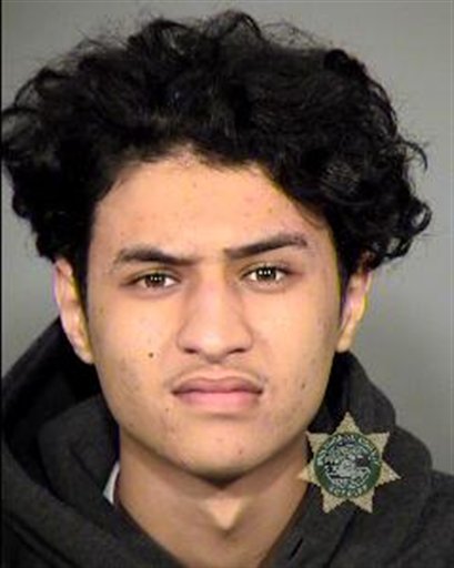 This undated photo provided by the Multnomah County Sheriff's Office shows Yazeed Mohammed Abunayyan. Police say the Saudi Arabian teenager swung his fist at a flight attendant and praised Osama bin Laden during a flight from Portland to Houston.