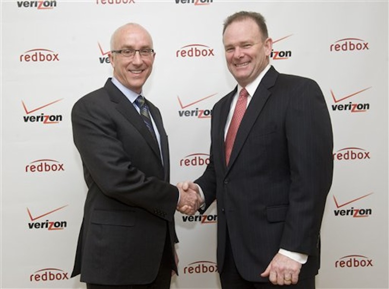 Bob Mudge, right, president of Verizon Consumer, and Paul Davis, CEO of Coinstar, Inc. announced Monday, Feb. 6 in New York a joint venture that delivers a combination of Redbox entertainment options with an on-demand streaming service from Verizon, Inc. (Diane Bondareff/AP)