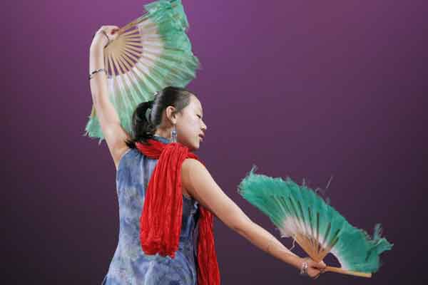 HAPPY NEW YEAR: Emily Zhao dances to Qing Hua Ci (Blue and White Porcelain) at the Westbrook Performing Arts Center on Saturday, as part of a Chinese New Year celebration sponsored by the Chinese American Friendship Association of Maine.