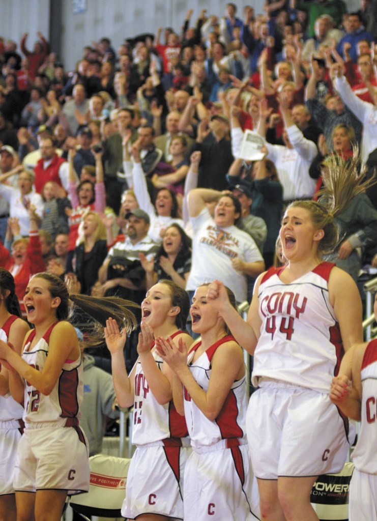 Cony players fans celebrate as time runs out and they win the Class A East championship game on Friday night at the Augusta Civic Center.