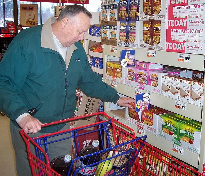 SAVING A LOT: Dwight Amos, 69, of Wilton, said he shops at the Farmington Save-A-Lot store because it's less expensive and more convenient than bigger grocery stores. A Save-A-Lot is opening this spring in downtown Waterville, according to the new store's majority owner Zak Sclar.