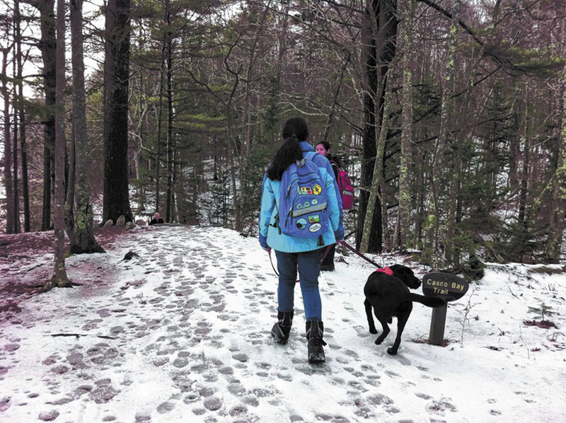 A NICE HIKE: Wolfe’s Neck Woods State Park in Freeport is a great place to bring the kids and dog for winter hiking. The walking is fairly easy and the ocean view makes up for light snow.