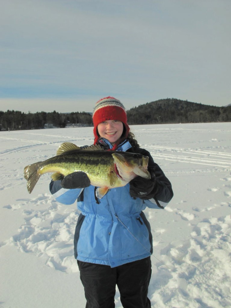A TROPHY CATCH: Many southern Maine lakes hold 4-pound largemouth bass such as this one. A little advance planning can help you catch larger fish.