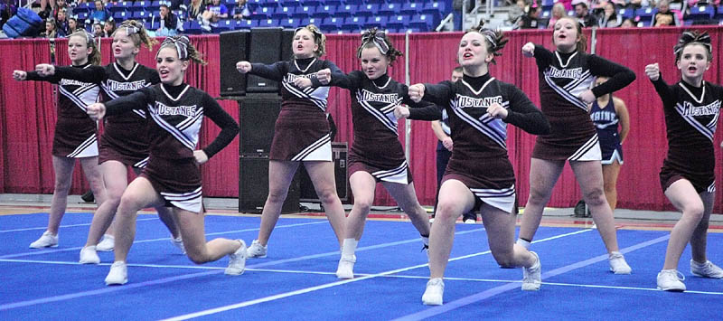 The Monmouth Academy Mustangs dance during the state cheerleading championships on Saturday at the Augusta Civic Center.