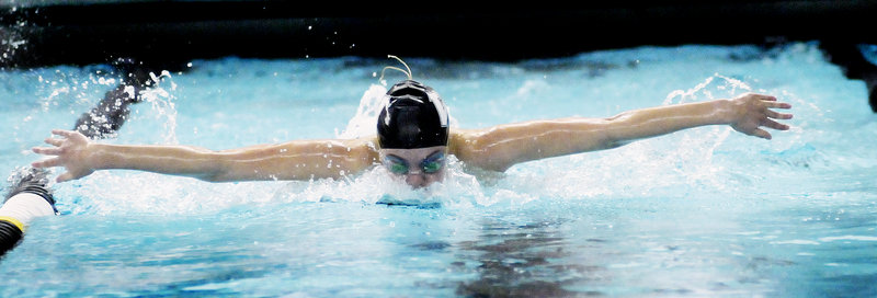 Colby Harvey, competing for Waynflete in a 100 butterfly prelim, went on to capture the state championship in the event in a time of 55.72 seconds at Bowdoin College.