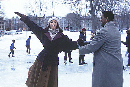 Whitney Houston and Denzel Washington skate on Portland's Deering Oaks pond in a scene from 1996's "The Preacher's Wife."
