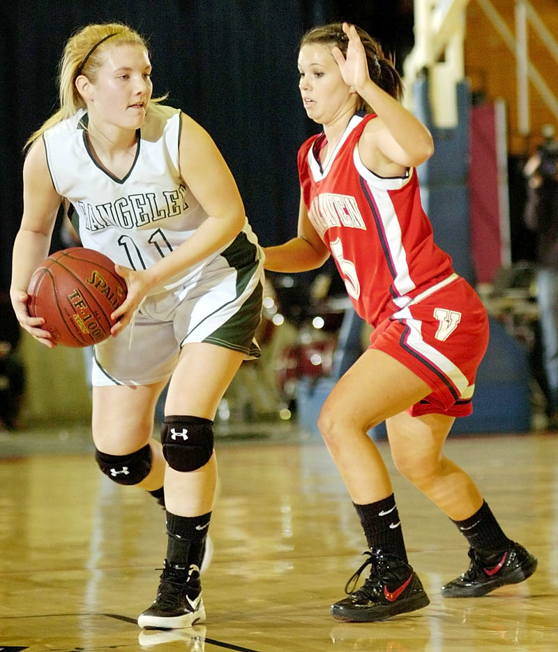 GOOD DEFENSE: Rangeley’s Seve Deery-DeRaps is guarded by Vinalhaven’s Eliza Davidson during the Western Maine Class D semifinals Thursday morning at the Augusta Civic Center.