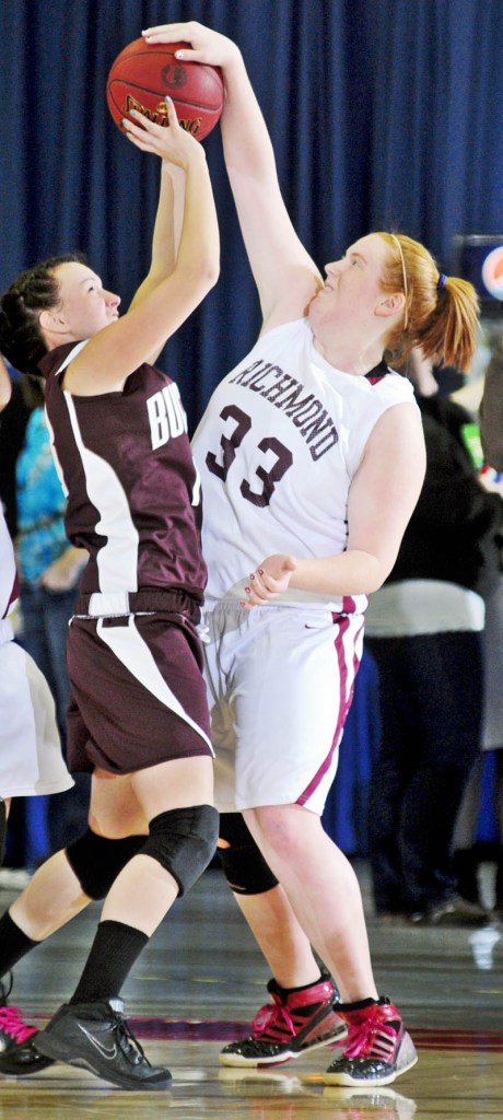 NOT HERE: Richmond’s Alyssa Pearson, right, blocks a shot by Buckfield’s Danielle Patrie during the Western Class D quarterfinals Tuesday morning at the Augusta Civic Center.