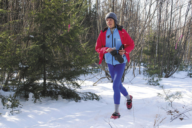 Stay warm: Desiree Sirois of Bar Harbor keeps an 8-minute, 24-second pace up on the 4.9-mile course of the State of Maine Championship last month in Orland. Of course, Sirois was running in trail shoes this year, not snowshoes.