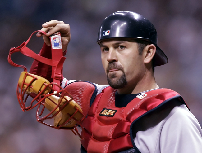 An April 2006 photo of Red Sox catcher Jason Varitek looking into the dugout during the first inning of a game against Tampa Bay in St. Petersburg, Fla. Now that the news is out Varitek has decided to retire after 15 seasons as the catcher in Boston, it doesn't make it any easier to take.