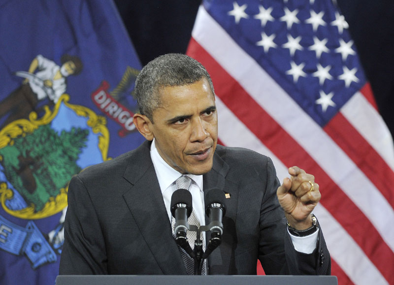 BUSY SCHEDULE: President Barack Obama addresses the crowd at Southern Maine Community College in South Portland on Friday night. The president later moved to a second fundraising event at the Portland Museum of Art.