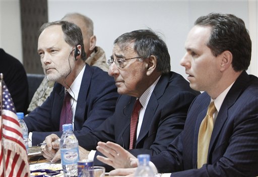 U.S. Secretary of Defense Leon Panetta, center, listens to his Afghan counterpart Bismillah Mohammadi, unseen, during a meeting at the interior ministry in Kabul today.