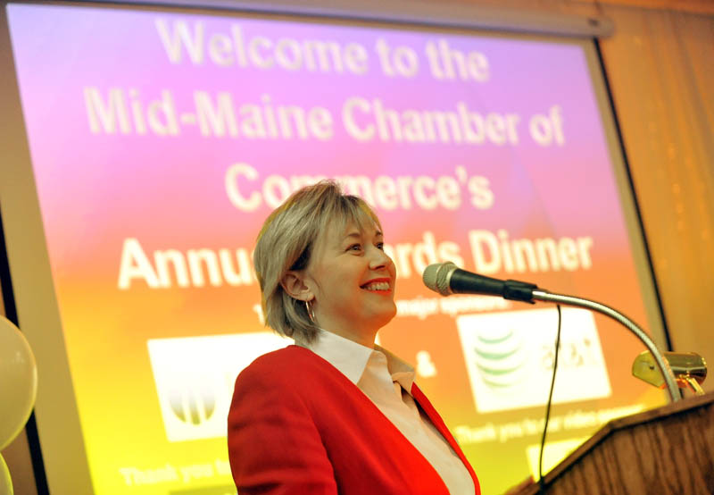 ANNUAL HONOR: Kim Lindlof, president and CEO of the Mid-Maine Chamber of Commerce, welcomes guests to the annual Mid-Maine Chamber of Commerce awards dinner at the Elks Lodge in Waterville on Wednesday night.