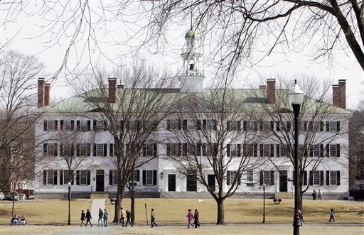 Students walk across the Dartmouth College campus in Hanover, N.H., on Monday. More than a quarter of the Sigma Alpha Epsilon fraternity's membership has been accused by the school's judicial council of hazing after a former member's public airing of what he says he experienced as a pledge in 2009.