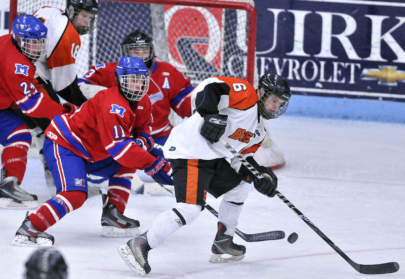 Photo by Michael G. Seamans in the second period of the Class B East hockey regional finals at Alfond Arena at the University of Maine in Orono Tuesday night.