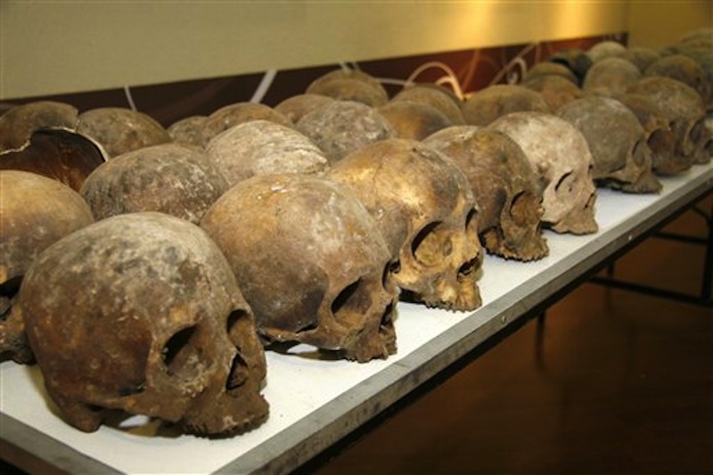 Skulls that were found in a cave sit on a table at the Chiapas state attorney general's office in Tuxla Gutierrez, Mexico on Saturday March 10, 2012. Mexican authorities say they've found the remains of as many as 167 people in a southern Mexican cave, and forensic experts believe the remains are at least 50 years old. (AP Photo/Chiapas State Attorney General's Office)
