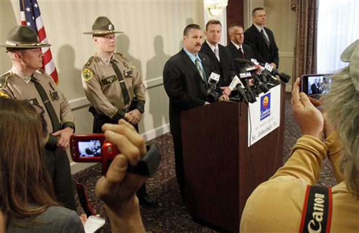 Vermont State Police Major Ed Ledo, center, speaking during a news conference today in St. Johnsbury, Vt., said Allen and Patricia Prue "knew Miss Jenkins and had snow plowed her driveway a couple of years ago."