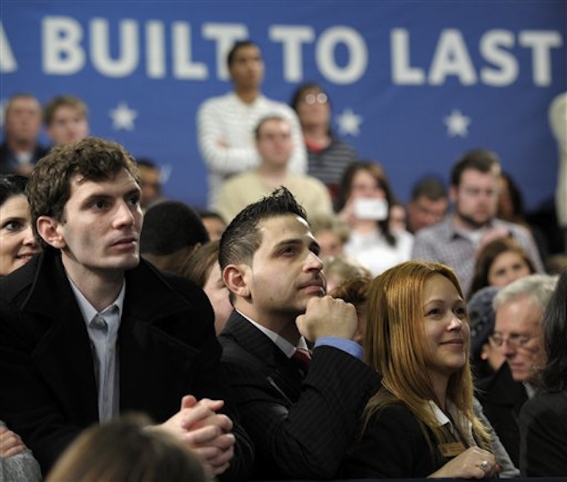 People listens as President Barack Obama speaks about his blueprint for an economy built to last with a focus on American energy, Thursday, March 1, 2012, at Nashua Community College, in Nashua, N.H. (AP Photo/Susan Walsh)