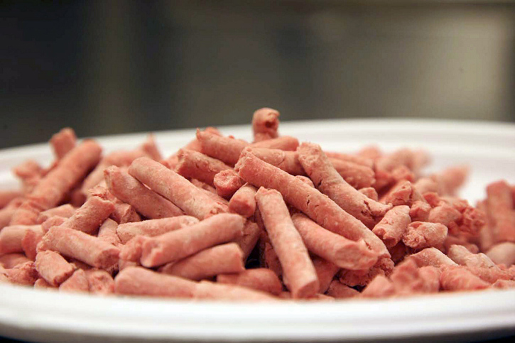 In this undated image released by Beef Products Inc., boneless lean beef trimmings are shown before packaging. The debate over "pink slime" in chopped beef is hitting critical mass.