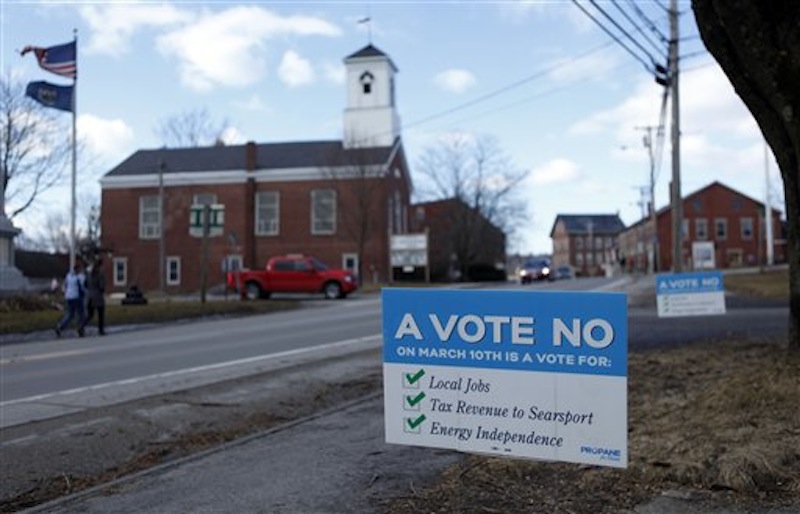 A sign in Searsport on Friday advocates support for a proposed 23 million-gallon propane tank.
