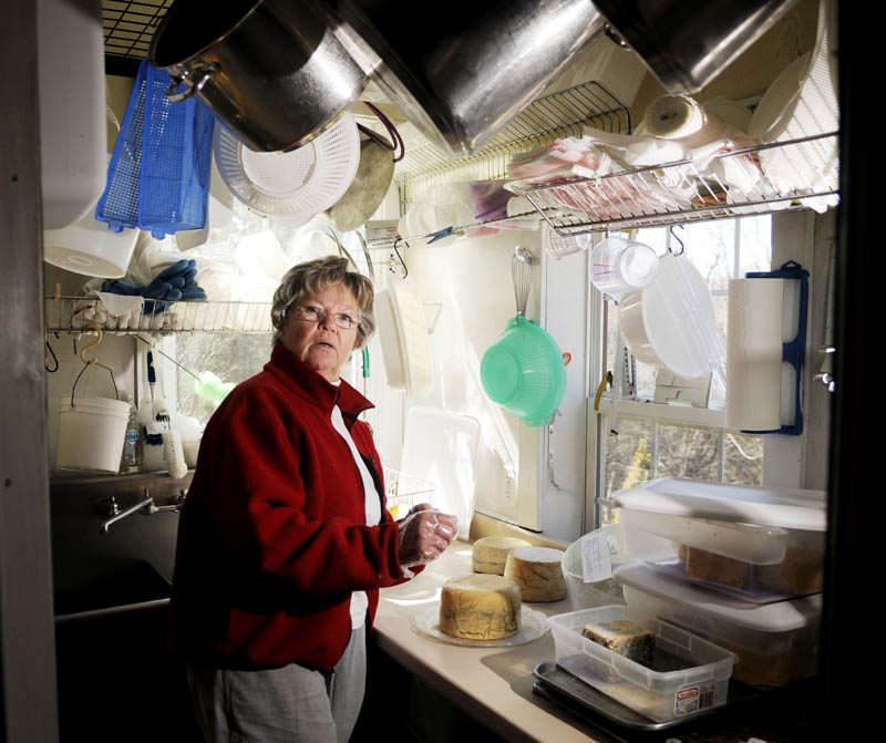 Barbara Skapa creates a variety of cheeses in a closet at Echo Ridge Farm in Mount Vernon on Tuesday. A variety of her cheeses are being served at a fundraiser for President Barack Obama.