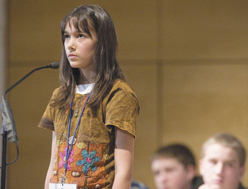 Ariana Cousins, from Kennebec County, ponders a word Saturday before spelling it at the Maine State Spelling Bee held at USM’s Hannaford Hall. Cousins and everyone else fell to eventual winner Nat Jordan from Cape Elizabeth