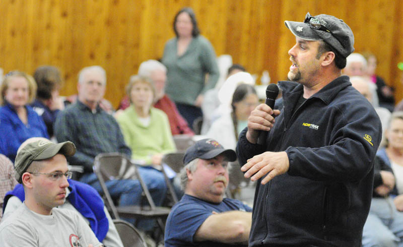 Road commissioner Kevin Hawes answers a question during the Belgrade town meeting on Saturday at the Center for All Seasons.