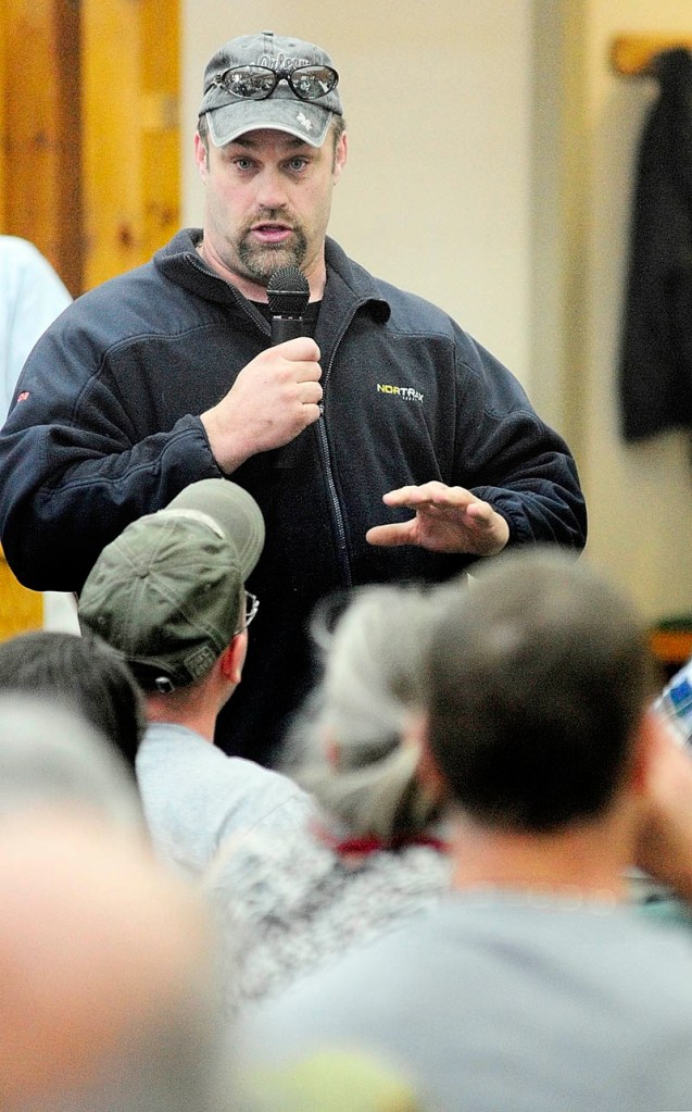 Road commissioner Kevin Hawes answers a question during the Belgrade town meeting on Saturday at the Center for All Seasons.