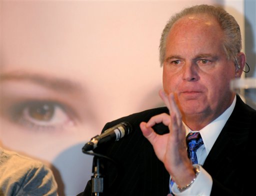 Radio talk-show host Rush Limbaugh speaks during a Miss America news conference in 2010. Limbaugh drew fire Friday from many directions for his depiction of a college student as a "slut" and "prostitute" because she testified before Congress about the need for contraceptive coverage.