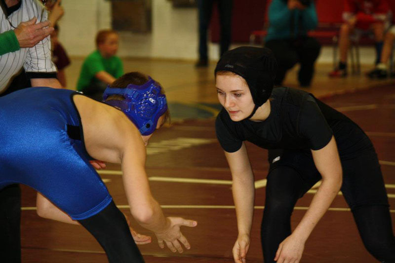 MEETING THE CHALLENGE: Monmouth eighth-grader Emily Levasseur, right, was introduced to wrestling in the sixth grade. She recently placed second in the girls New England Open in Nashua, N.H, and will now compete in the 15th annual National Girls Wrestling championships March 31 and April 1 at Eastern Michigan University in Ypsilanti, Mich.