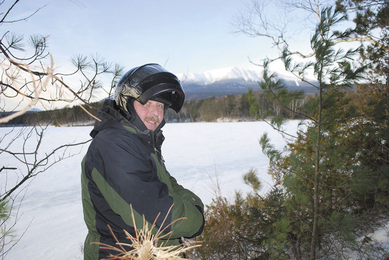LOOKING IT OVER: Baxter State Park Chief Ranger Ben Woodard says the new regulations regarding solo and small group trips during the winter have proved extremely popular.