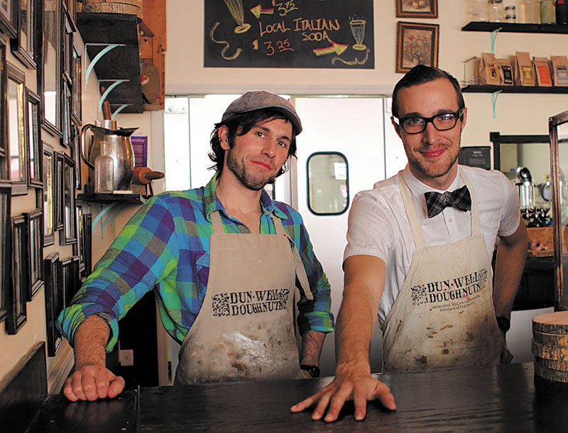 TIME TO MAKE THE DOUGHNUTS: Winslow High School graduate Dan Dunbar, left, and Christopher Hallowell are co-owners of Dun-Well Doughnuts in Brooklyn, N.Y. The shop was recently crowned by the New York Daily News as having the best doughnuts in the city.