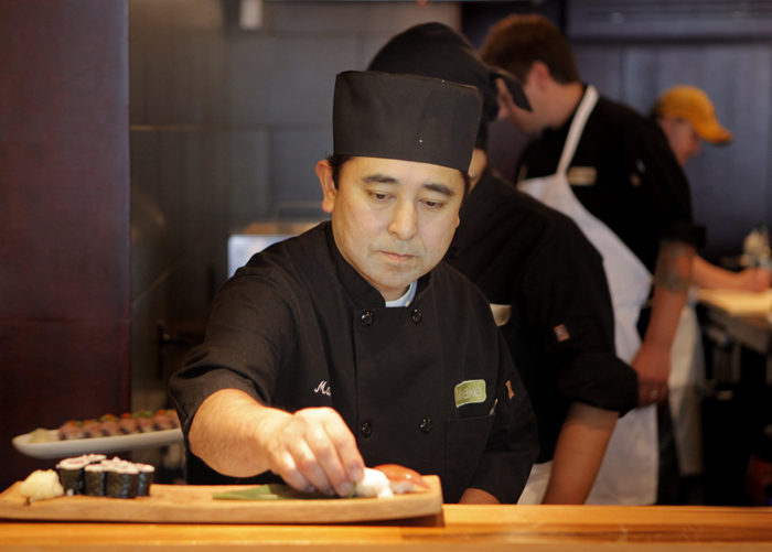 Chef Masa Miyake prepares lunch at his restuarant in Portland in this July 27, 2011, photo.