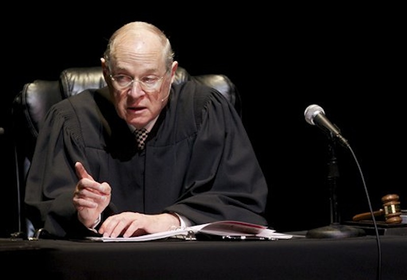 In this Jan. 31, 2011 photo, U.S. Supreme Court Justice Anthony Kennedy presides over a representation of "The Trial of Hamlet" at the Shakespeare Center of Los Angeles. During Supreme Courts arguments last week over the constitutionality of the health care law Justice Kennedy mused that Congress could have created a Medicare-style program for the uninsured, run exclusively by the government without the involvement of private insurers. (AP Photo/Damian Dovarganes, File)