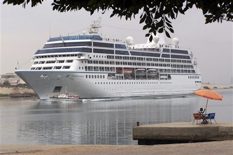 The Azamara Quest sails through the Suez canal, Egypt, in this April 30, 2010 photo on its way to Athens. The fire on the Azamara Quest started late Friday, March 30, 2012 a day after the ship left Manila for Sandakan, Malaysia. Five crew members were injured. (AP Photo/File)