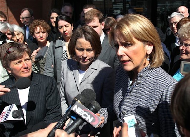 Attorney General Martha Coakley, right, addresses reporters outside, along with Mary Bonauto, an attorney for GLAD, and Maura Healey, center, the Chief of Public Protection and Advocacy Bureau with the AG's office at the U.S.Court of Appeals at the Moakley Federal Court on Wednesday April 4, 2012 in Boston. Lawyers for a gay and lesbian legal advocacy group have a told a federal appeals court panel that a federal law that denies benefits to married gay couples that heterosexual couples get is discriminatory. (AP Photo/The Boston Globe,John Tlumacki)