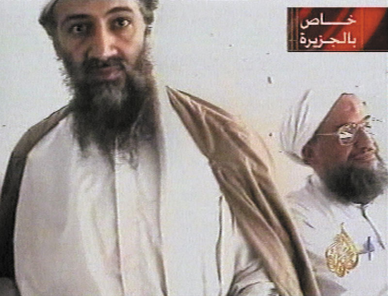 TERRORIST NETWORK: This undated image taken from video released by Qatar’s Al-Jazeera television broadcast on Oct. 5, 2001, purports to show al-Qaida leader Osama bin Laden, left, and his top lieutenant, Egyptian Ayman al-Zawahri. One year after the American raid that killed bin Laden, al-Qaida dreams still of payback, and U.S. counterterrorism officials warn that, in time, its offshoots may deliver. Al-Zawahri is thought to be hiding, out of U.S. reach, in Pakistan’s mountains, just as bin Laden did for many years.